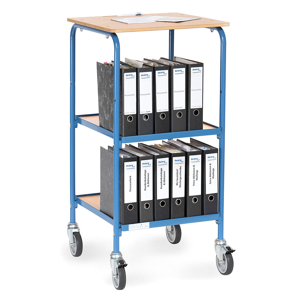 ein blaues FETRA® Rollpult mit 3 Etagen, gefüllt mit Büroordnern auf weißem Hintergrund