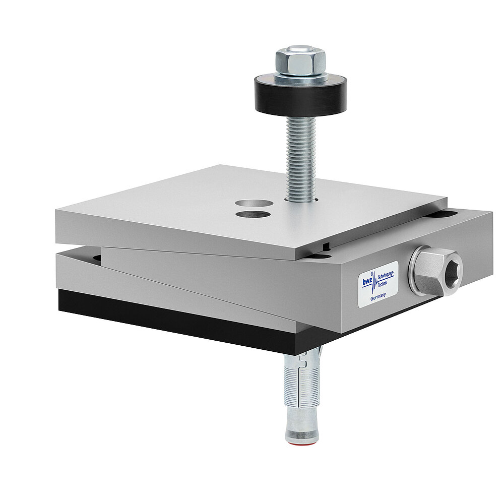 a square, height-adjustable machine mount made of precision-milled metal, adjusted in minimum height position, consisting of top, middle and bottom part lacquered in silver colour, with the wedge-shaped middle part featuring a protruding centered hexagonal screw for height adjustment, two holes for fastening screws in the top part, a fastening screw passing through the bottom part and sticking out on top with a screwhead isolation disc at the top screw end, a medium-thick black elastomer with smooth surface for vibration damping at the bottom and below, a zinc-galvanized ground dovel, isolated on white background