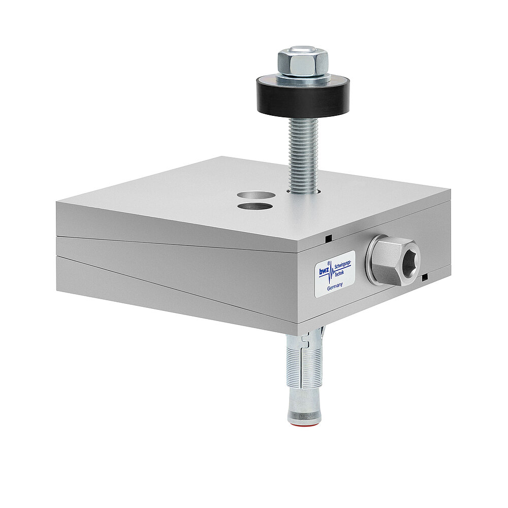 a square, height-adjustable machine mount made of precision-milled metal, adjusted in middle position, consisting of top, middle and bottom part lacquered in silver colour, with the wedge-shaped middle part featuring a protruding centered hexagonal screw for height adjustment, two holes for fastening screws in the top part, a fastening screw passing through the bottom part and sticking out on top with a screwhead isolation disc at the top screw end and below, a zinc-galvanized ground dovel, isolated on white background