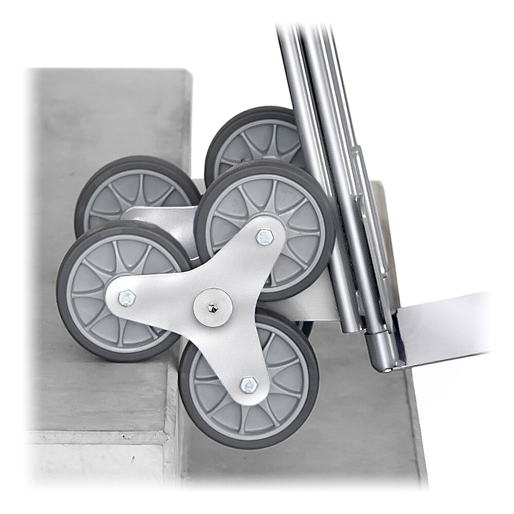 Detailaufnahme eines dreiarmigem Radsterns an einer silberfarbenen FETRA® Treppenkarre aus Aluminium-Stahlrohr auf einer Betontreppe