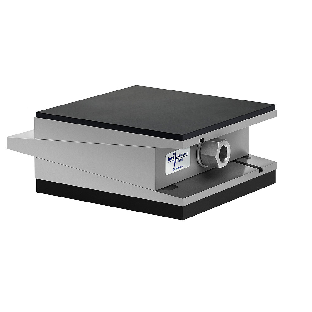 a square, height-adjustable machine mount made of precision-milled metal, adjusted in maximum height position, consisting of top, middle and bottom part lacquered in silver colour, with the wedge-shaped middle part featuring a protruding centered hexagonal screw for height adjustment, a medium-thick black elastomer with smooth surface for passive vibration isolation at the bottom and a thinner black elastomer with smooth surface at the top for non-slip protection, isolated on white background