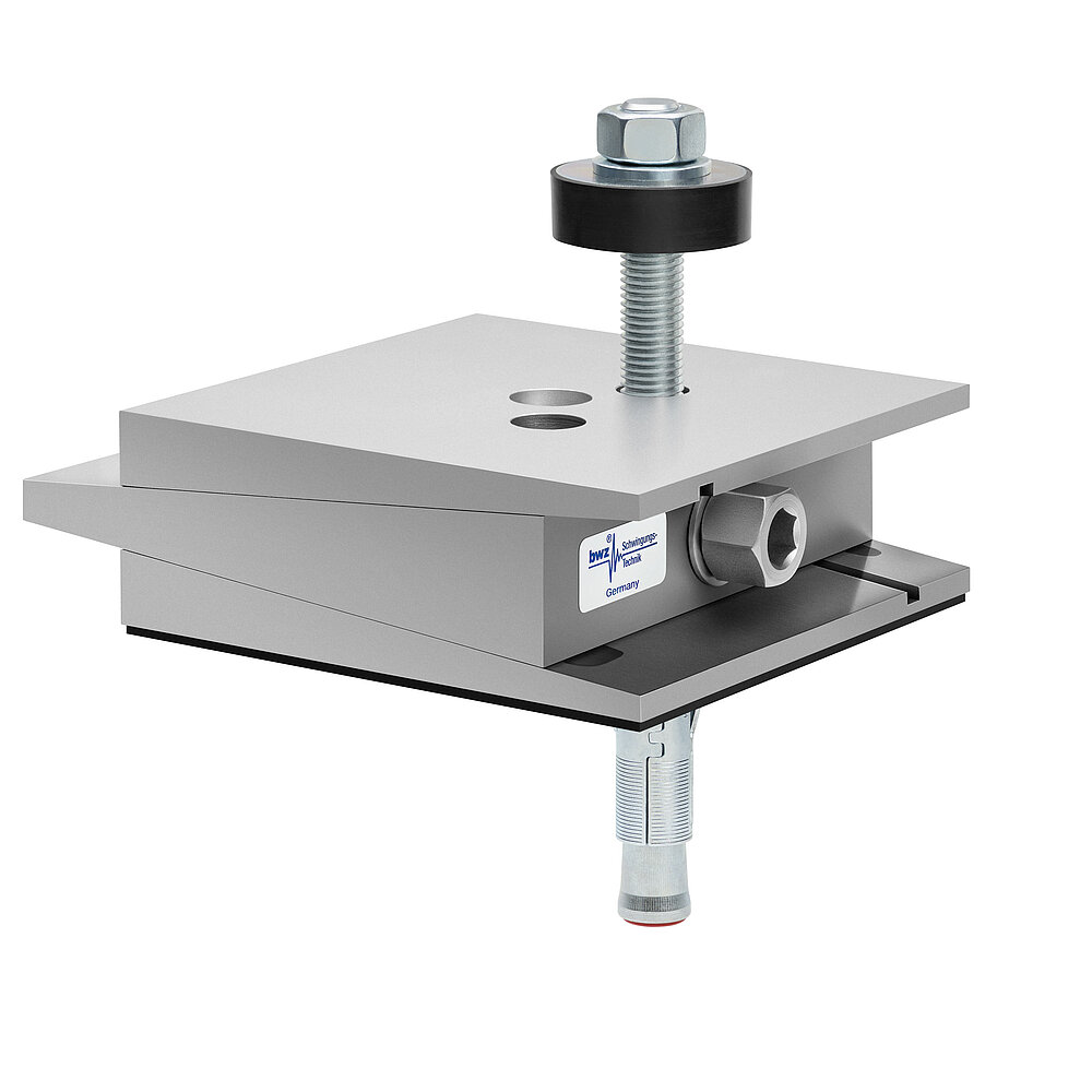 a square, height-adjustable machine mount made of precision-milled metal, adjusted in maximum height position, consisting of top, middle and bottom part lacquered in silver colour, with the wedge-shaped middle part featuring a protruding centered hexagonal screw for height adjustment, two holes for fastening screws in the top part, a fastening screw passing through the bottom part and sticking out on top with a screwhead isolation disc at the top screw end, a thin black elastomer with smooth surface for non-slip protection at the bottom and below, a zinc-galvanized ground dovel, isolated on white background
