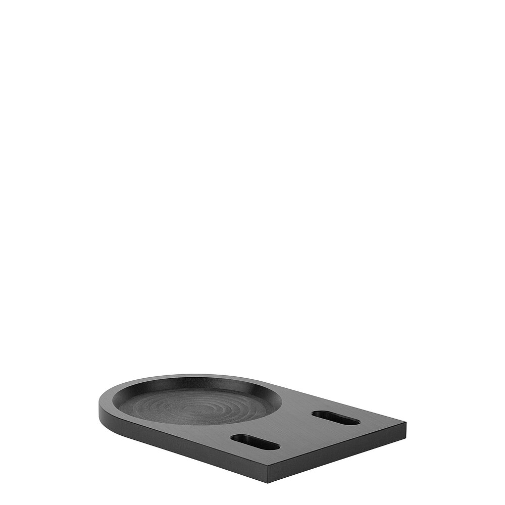 eine schwarze Befestigungsplatte aus gefrästem Kunststoff für Nivellierelemente in der Seitenansicht, freigestellt auf weißem Hintergrund