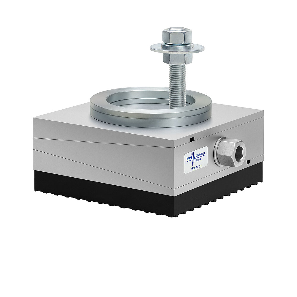 a square, height-adjustable machine mount made of precision-milled metal, adjusted in middle position, consisting of top, middle and bottom part lacquered in silver colour, with the wedge-shaped middle part featuring a protruding centered hexagonal screw for height adjustment, an angular compensation calotte consisting of two spherical, aligned metal rings fastened onto the top part, a fastening screw fastened in the bottom part and a thick black elastomer with structured surface for vibration isolation at the bottom, isolated on white background