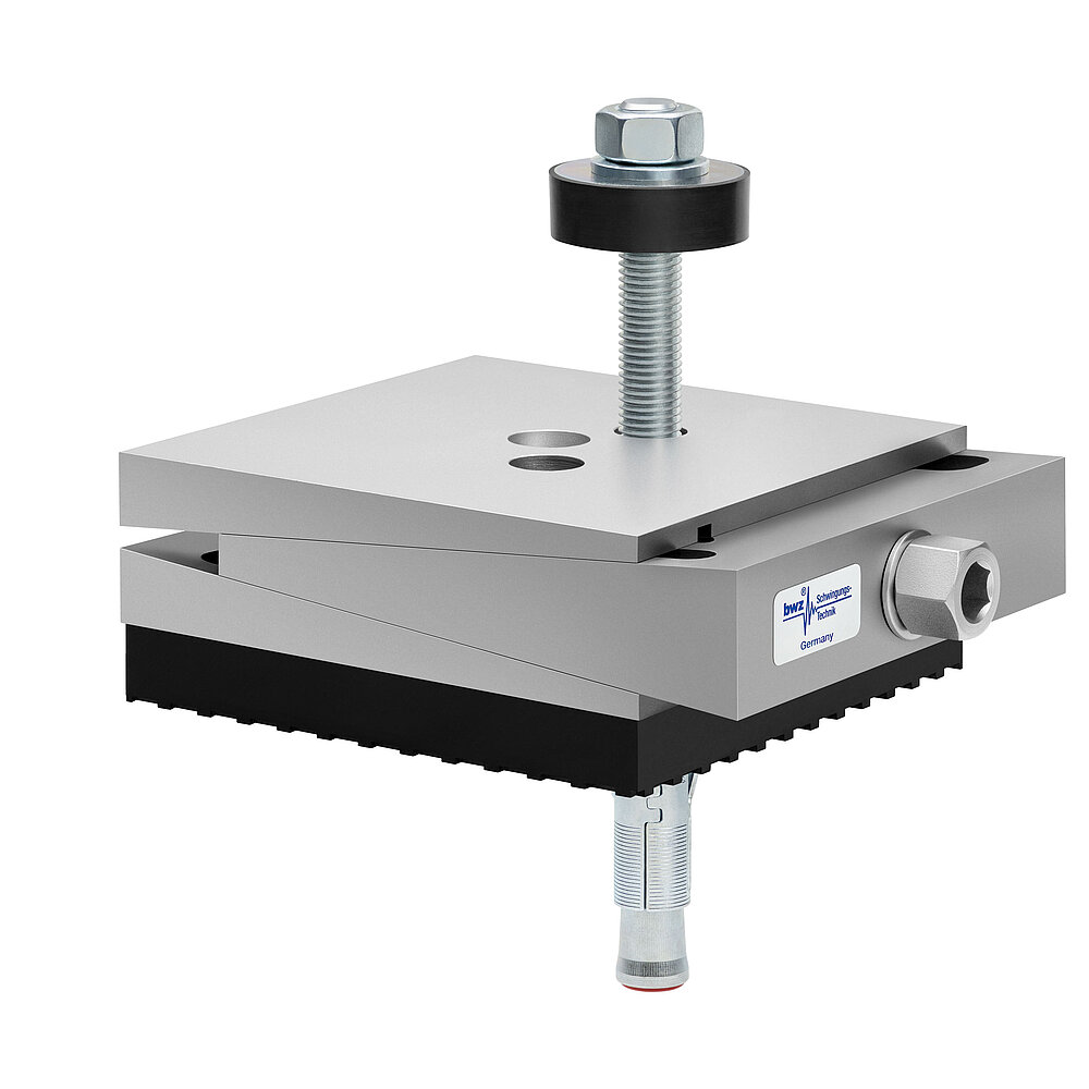 a square, height-adjustable machine mount made of precision-milled metal, adjusted in minimum height position, consisting of top, middle and bottom part lacquered in silver colour, with the wedge-shaped middle part featuring a protruding centered hexagonal screw for height adjustment, two holes for fastening screws in the top part, a fastening screw passing through the bottom part and sticking out on top with a screwhead isolation disc at the top screw end, a thick black elastomer with structured surface for vibration isolation at the bottom and below, a zinc-galvanized ground dovel, isolated on white background